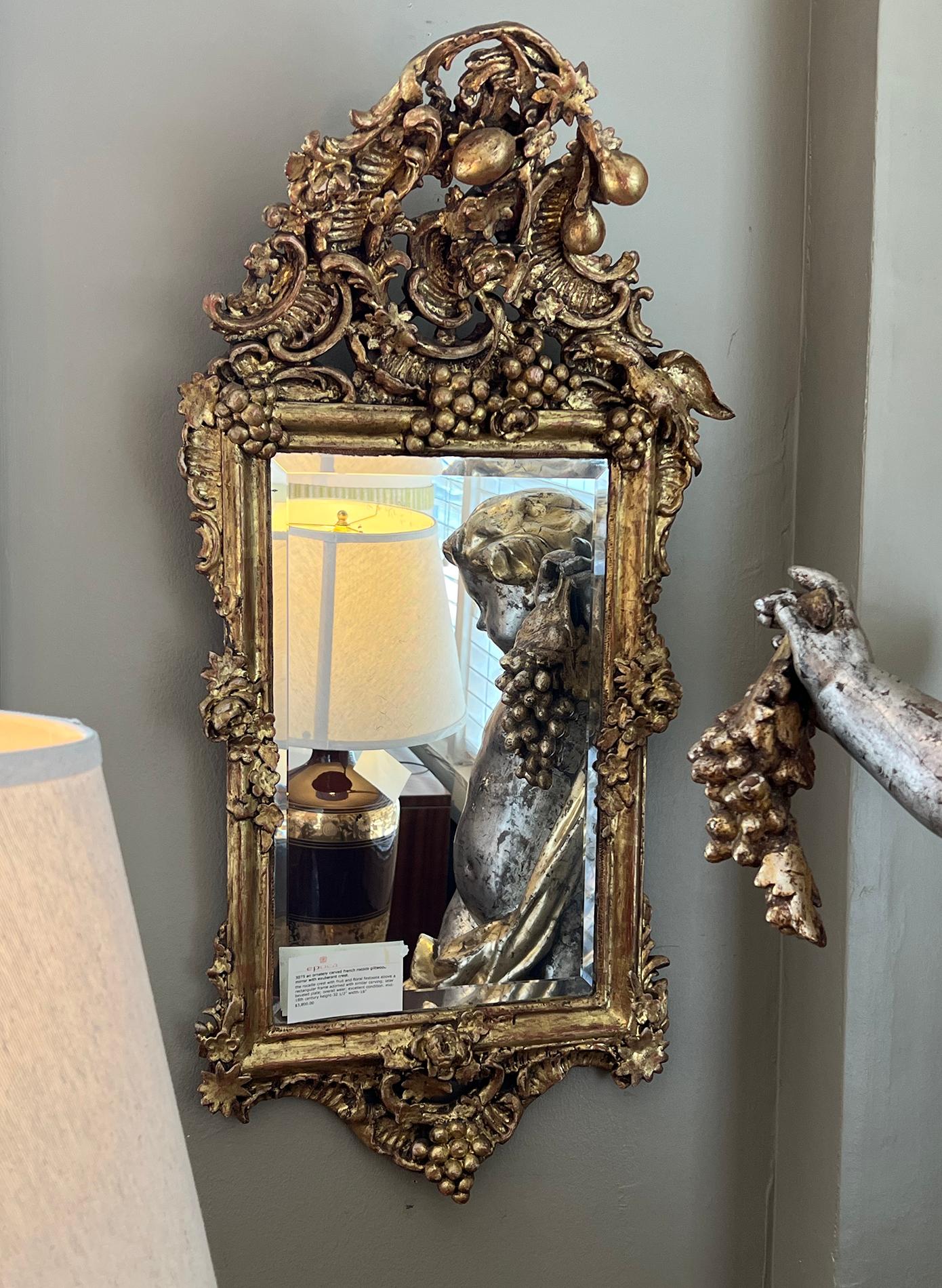 Giltwood Ornately Carved French Rococo Gilt-wood Mirror with Exuberant Crest For Sale