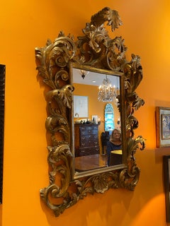 Ornately Carved Italian Gold Gilt Mirror, circa 1890