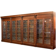 Ornately Carved Oak Bookcase with Leaded Glass Doors