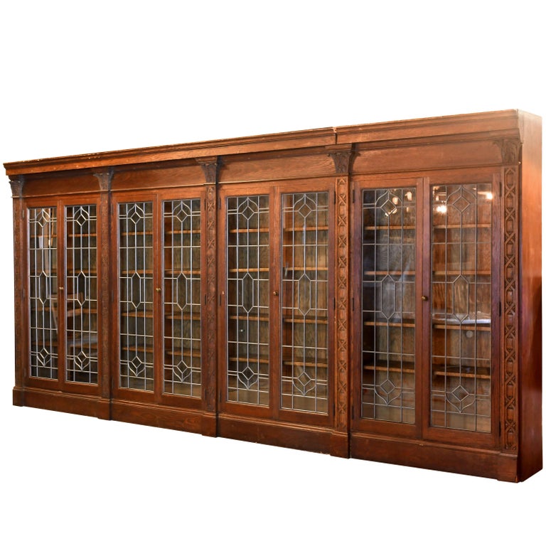Ornately Carved Oak Bookcase with Leaded Glass Doors at 1stDibs