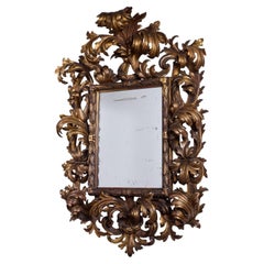 Ornately Carved Parcel-Gilt Mirror with Original Glass — Central Italy, Circa 18