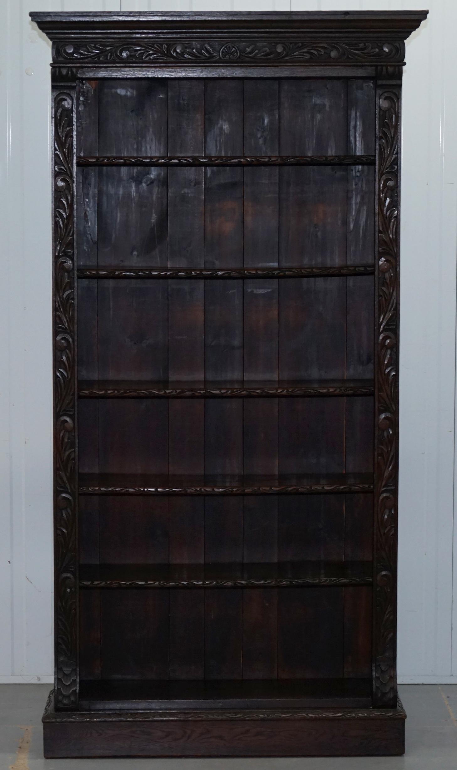 We are delighted to offer for sale this stunning heavily carved solid oak Victorian bookcase made in the Jacobean style

A good looking, well made and solid piece, all front facing timber is ornately hand carved including the ends of the shelves,