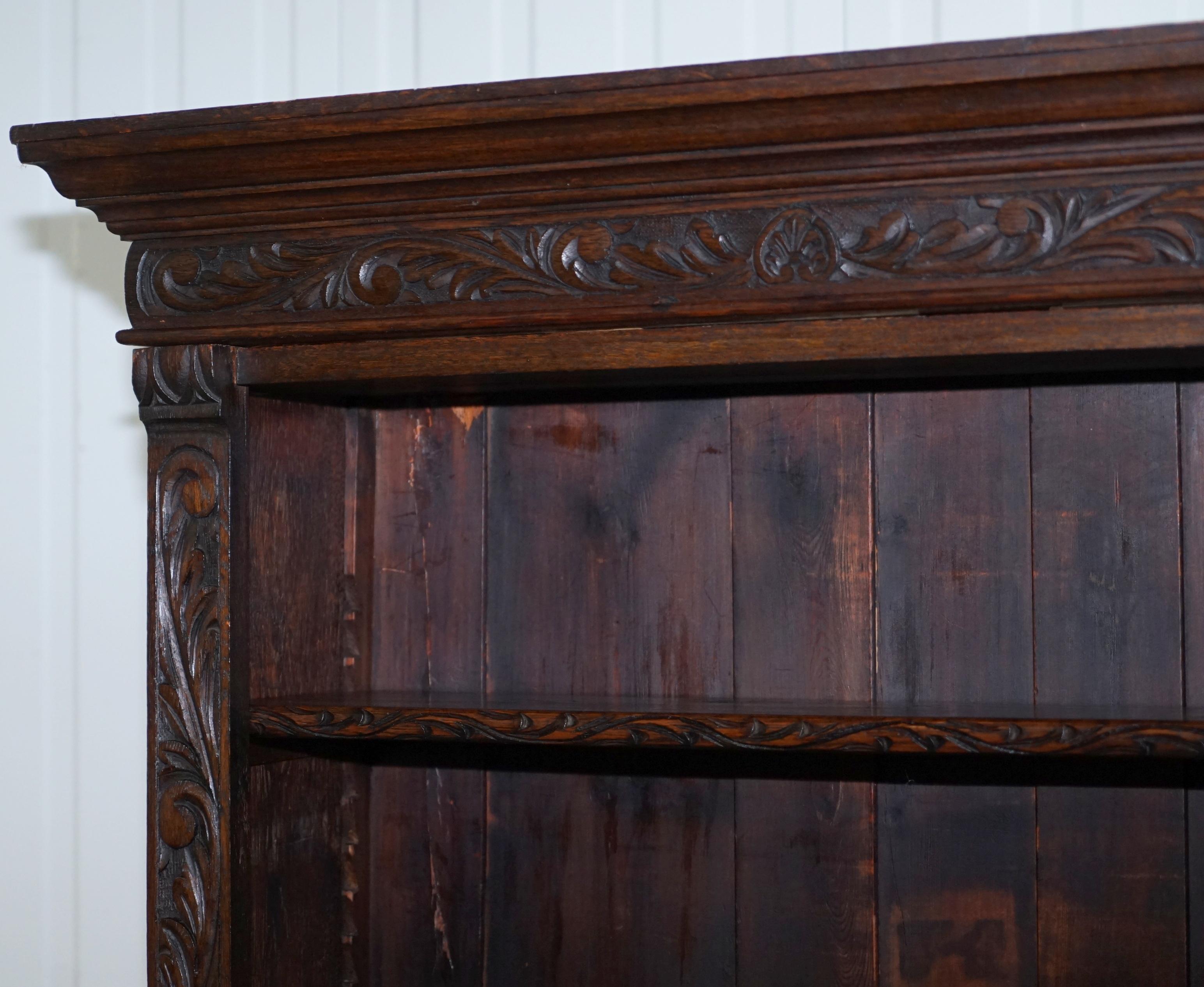 19th Century Ornately Carved Solid English Oak Victorian Library Bookcase in Jacobean Style