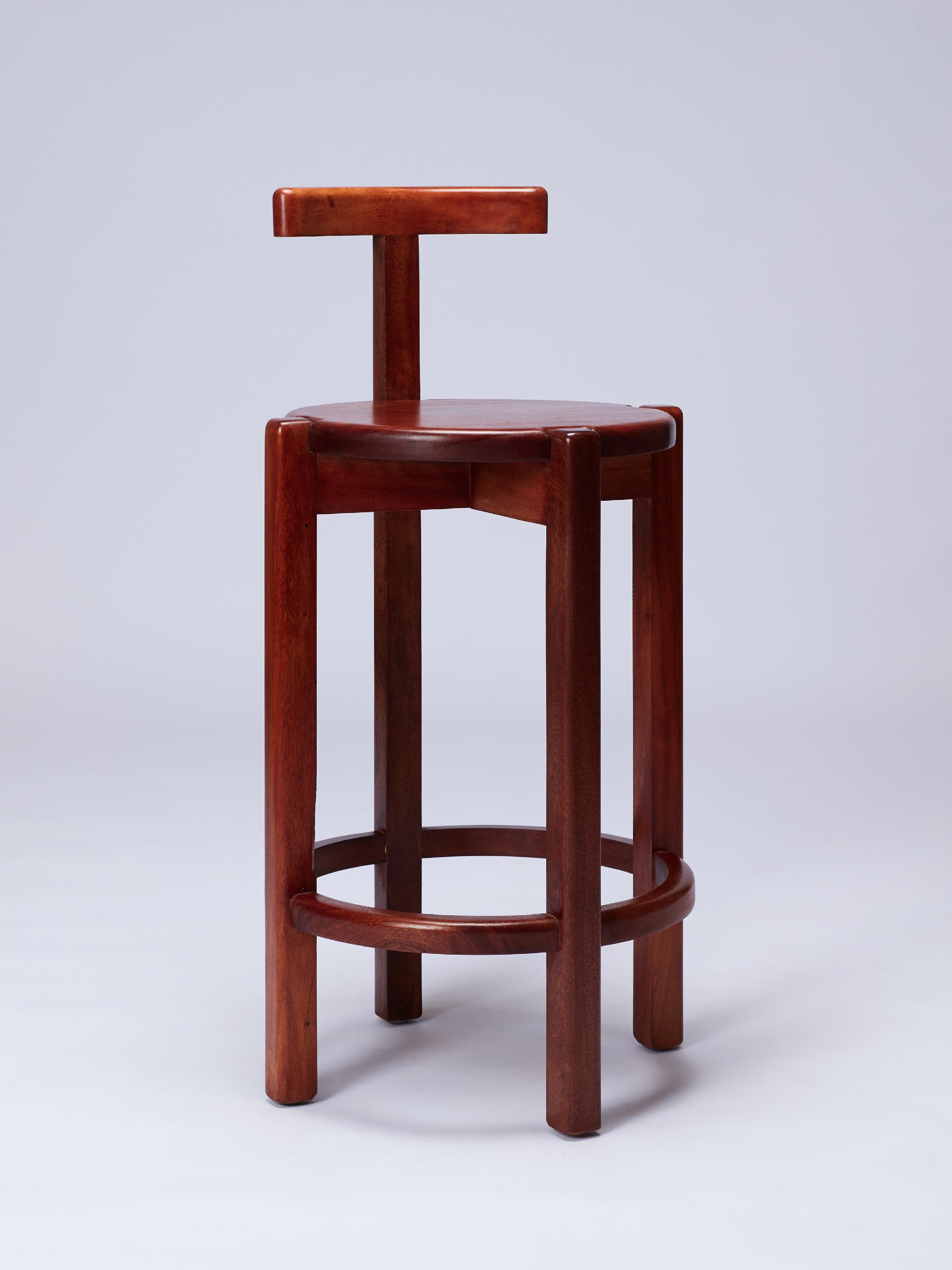 The Orno bar stool is part of the Orno collection, our first to be entirely made of hardwood. All pieces were designed under a same construction system that consists of basic structural elements –columns, beams, support planes– and whose joints are