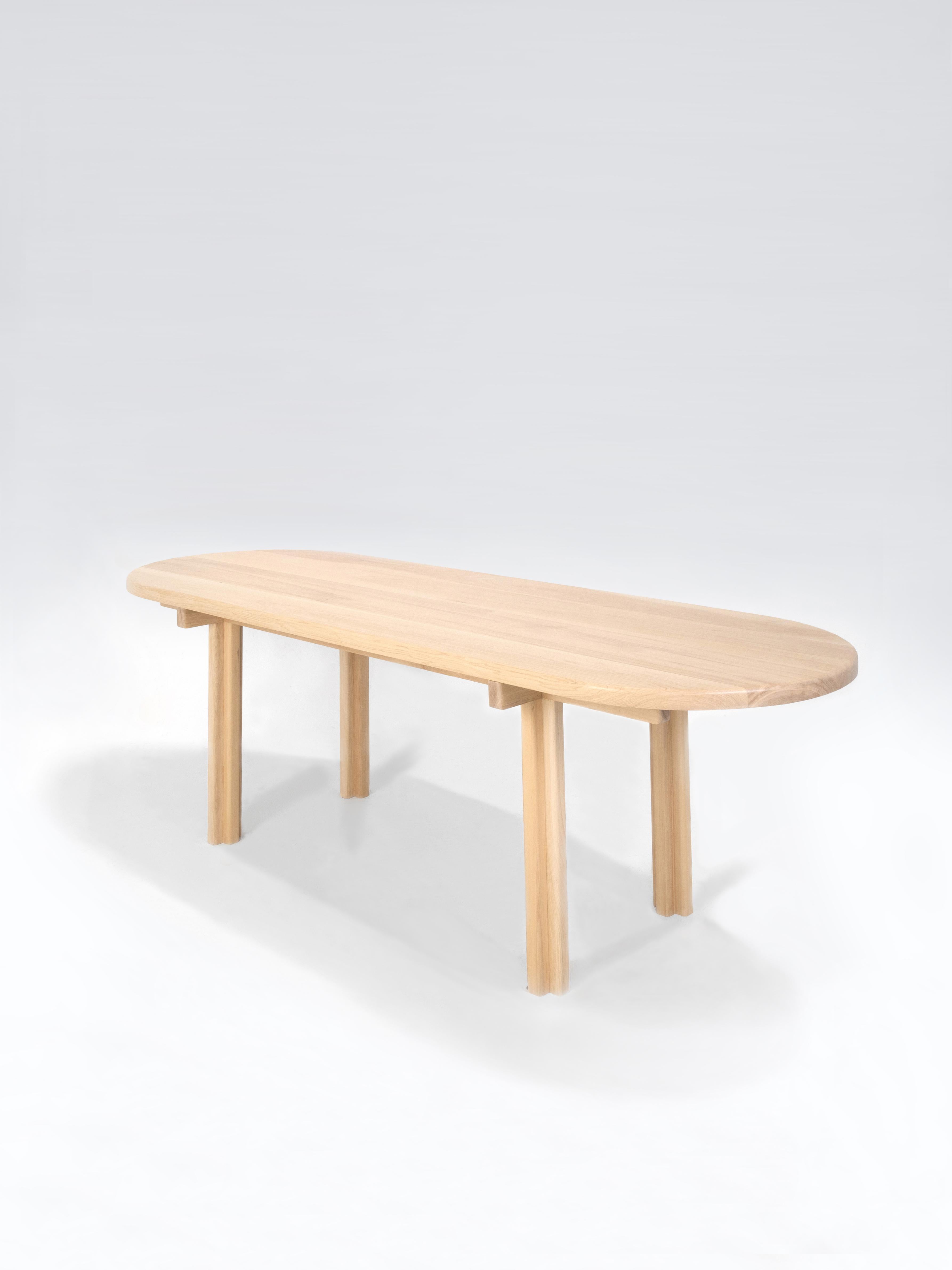 The Orno dining table is part of the Orno collection, our first to be entirely made of hardwood. All pieces were designed under a same construction system that consists of basic structural elements, columns, beams, support planes, and whose joints