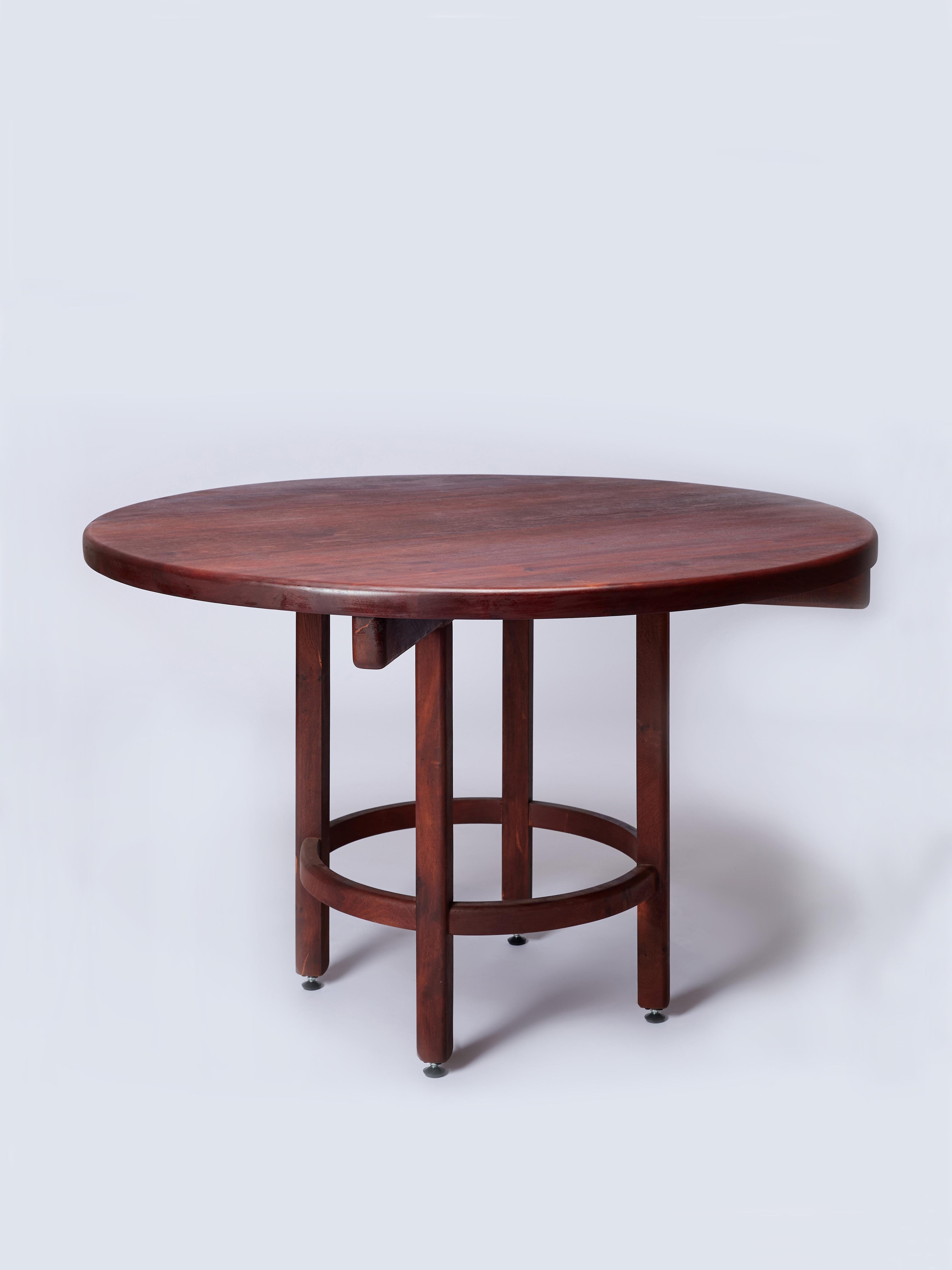 The Orno round dining table is part of the Orno collection, our first to be entirely made of hardwood. All pieces were designed under a same construction system that consists of basic structural elements –columns, beams, support planes– and whose