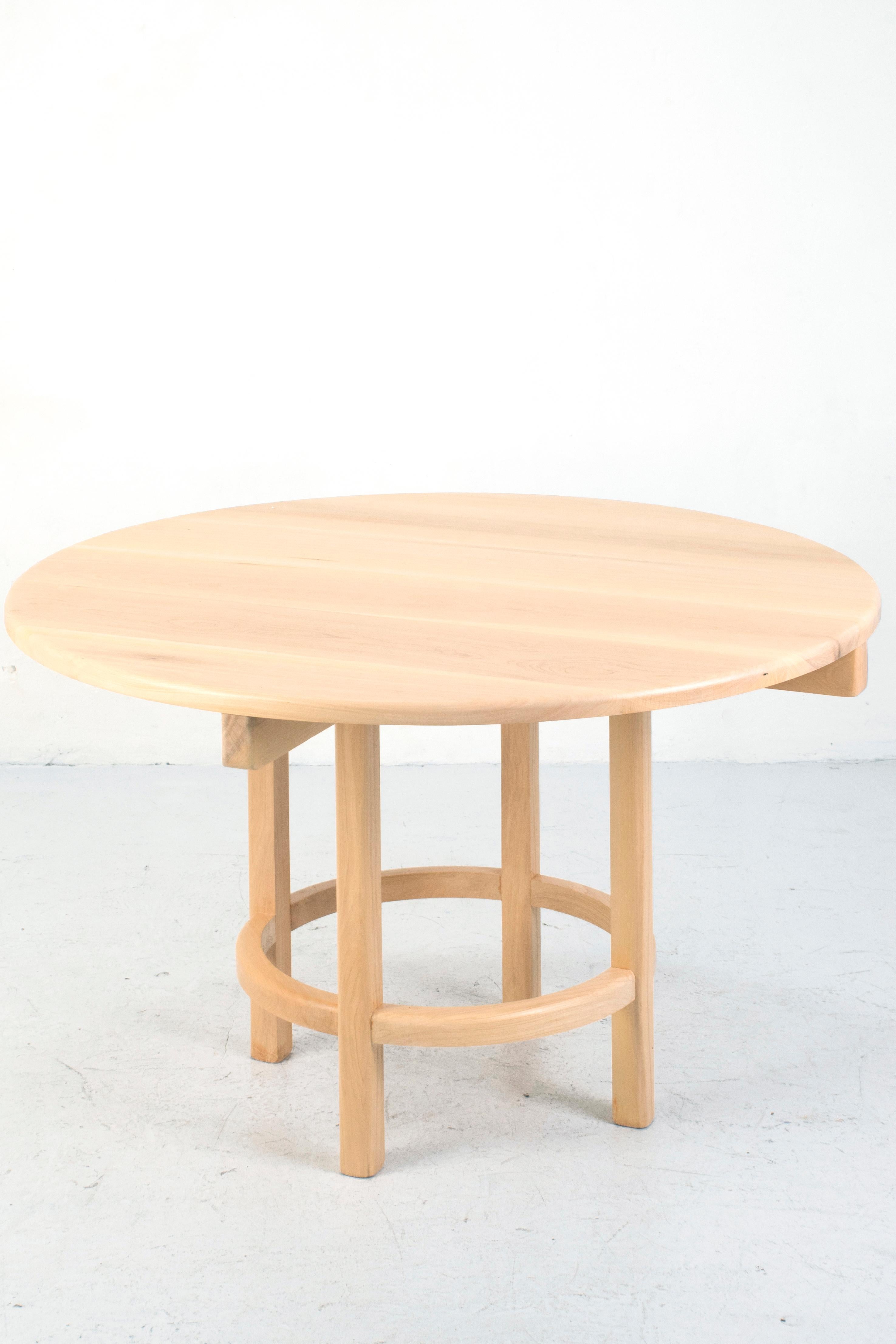 Orno Round dining table by Ries
Dimensions: D120 x H73 cm 
Materials: Hardwood
Transparent matte lacquer, color matte lacquer (finishings)

Ries is a design studio based in Buenos Aires, Argentina, focused on product and conemporary furniture