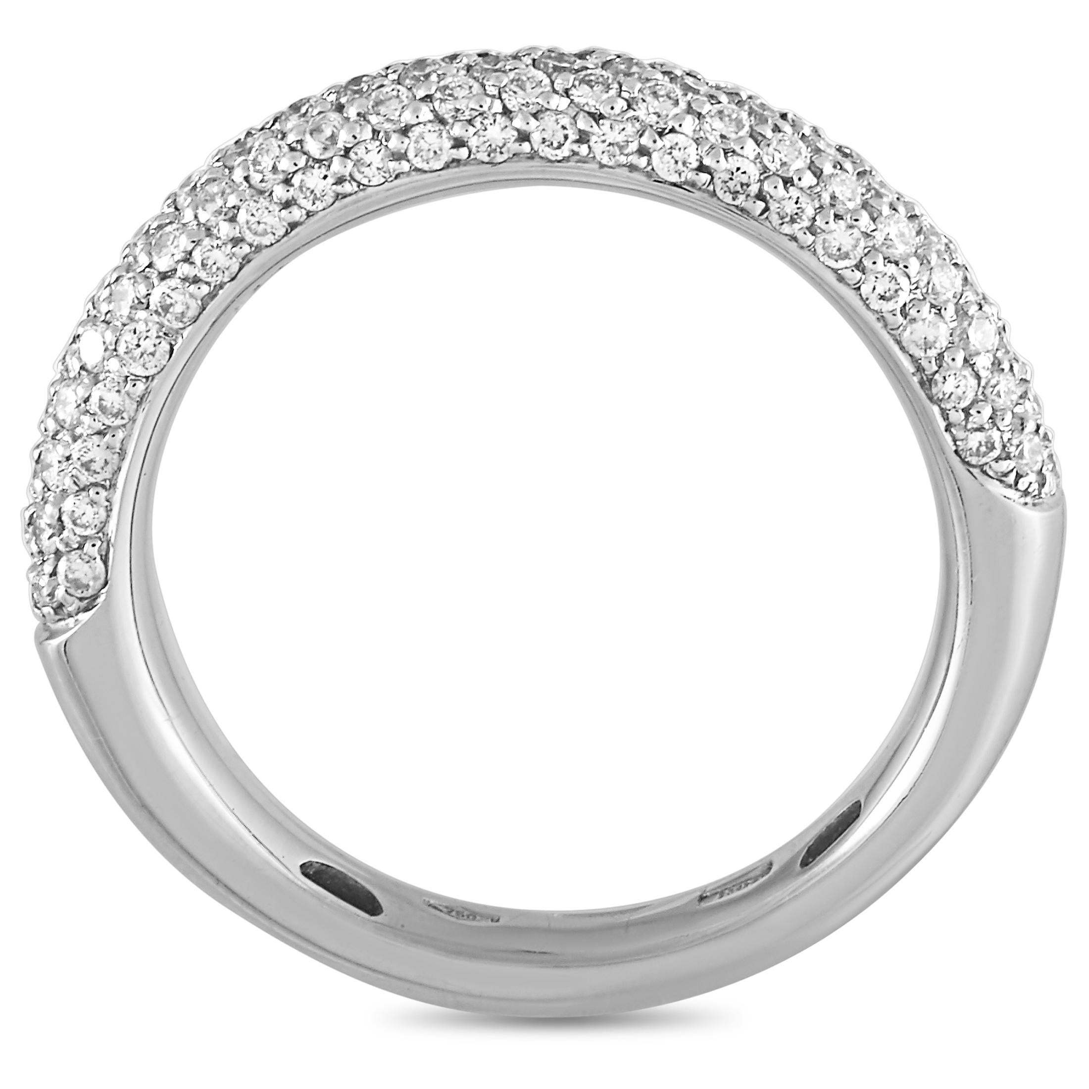 This Oro Trend ring is made out of 18K white gold and diamonds that total 0.69 carats. The ring weighs 4.4 grams and boasts band thickness of 3 mm and top height of 3 mm, while top dimensions measure 3 by 22 mm.

Offered in brand new condition, this
