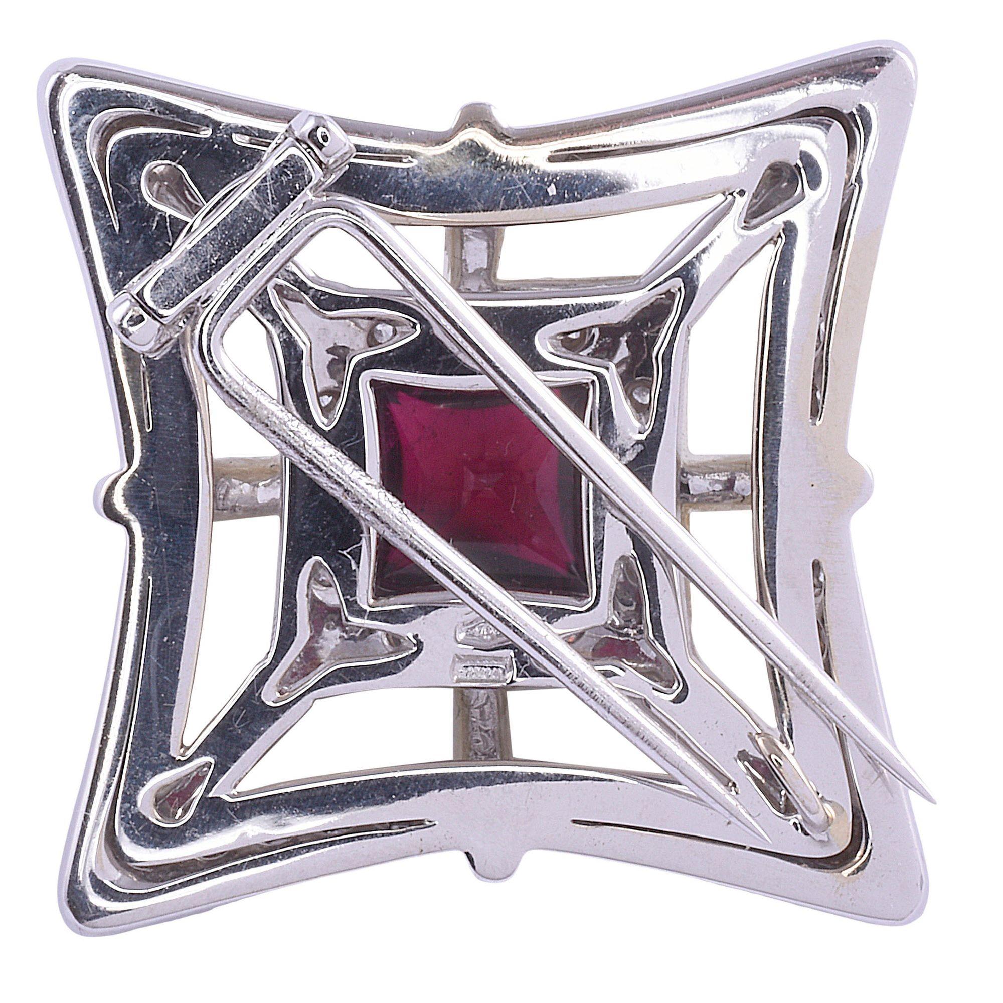 Estate Italian Oro Trend rubellite tourmaline 18K white gold pin or pendant. This brooch by Oro Trend is crafted in 18 karat white gold and may also be worn as a pendant. The Oro Trend pin features a rubellite tourmaline center set above a large