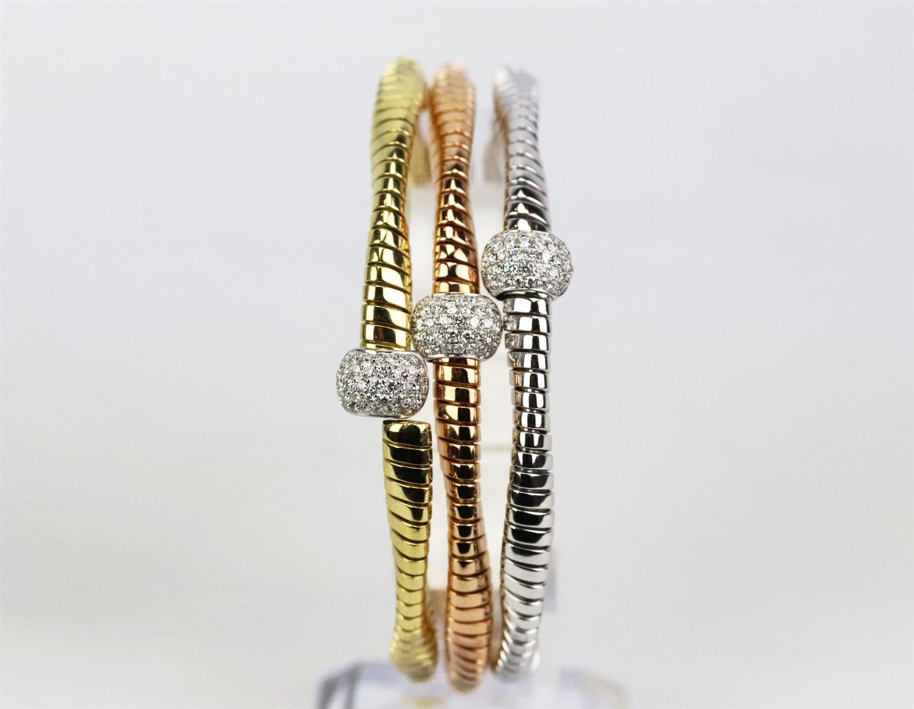 This set of 3 bracelets by Oro Trend is made from 18k rose gold, yellow gold and white gold twisted band with pave white diamond beads on the front. 18k yellow gold, rose gold and white gold. Slide fastening at diamond link. Does not come with box