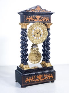 Orologio a pendolo NAPOLEONE III struttura a portico con colonne tortili. 1800