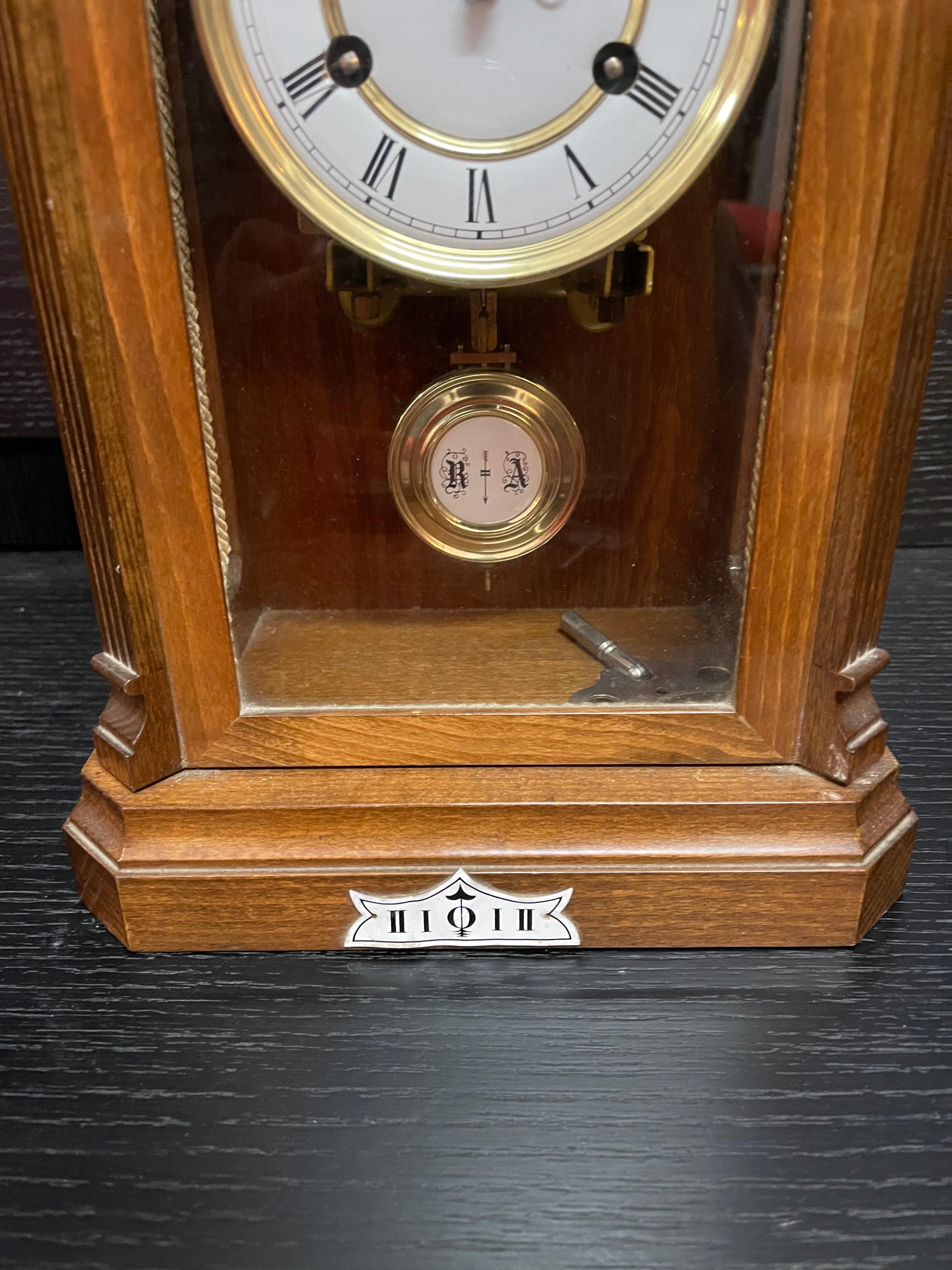 old wall clock with pendulum