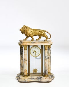 Architectural clock with lion and gilded bronze