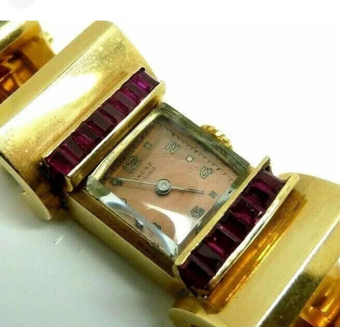 Anonymous 1930s high jewelry ladies' watch in solid 18K yellow gold with natural baguette-cut rubies. Hand-wound Ancre 15 rubis movement (anchor escapement) fully functional and accurate, overhauled year 2023.
 
Total watch length 18 centimeters,