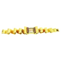 Art Deco style Vintage women's watch in 18k solid gold with rubies
