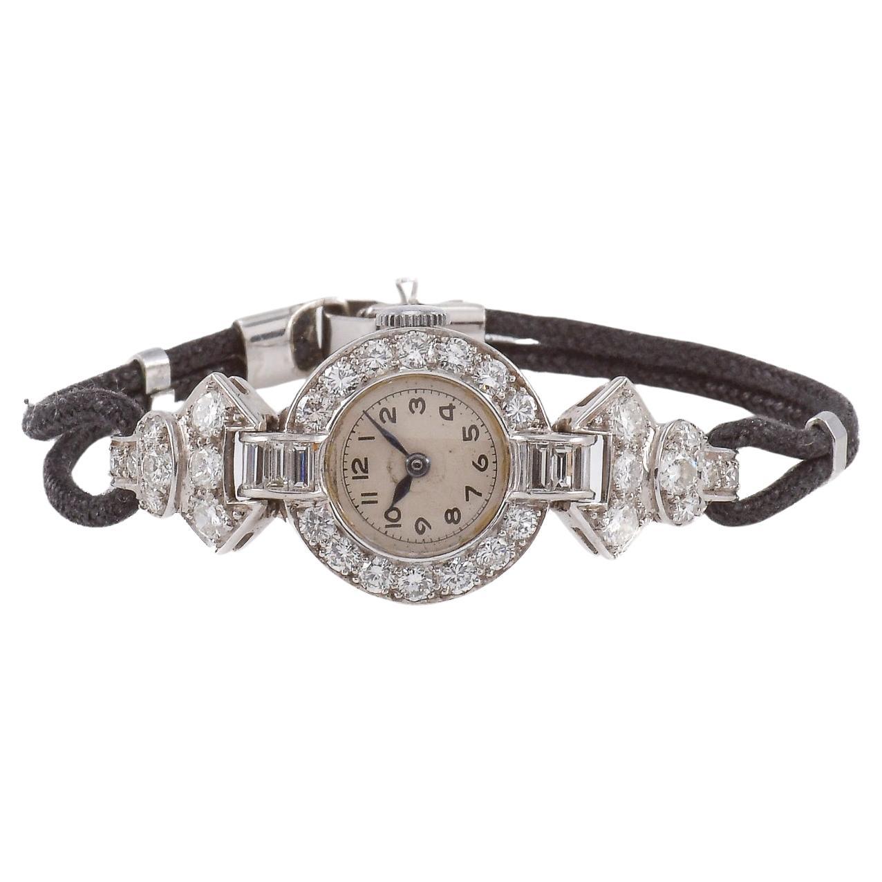 Reloj de noche de oro blanco con diamantes