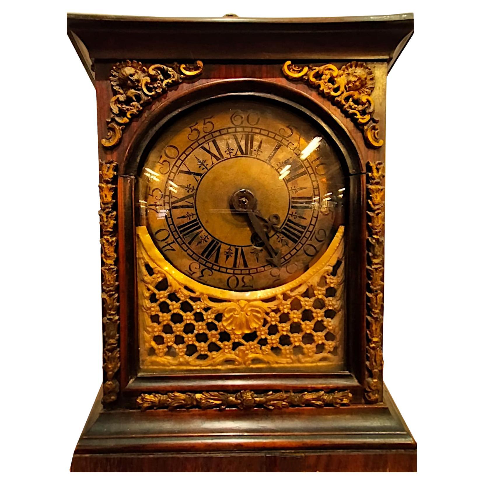 Table clock from the early 1700s,  rosewood and gilded bronzes For Sale