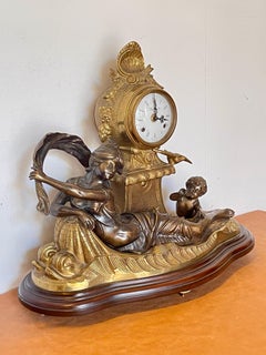 Art Nouveau bronze table clock, "The Muse of Time" 20th century