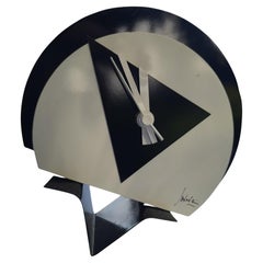 Radical Memphis style table clock, lacquered metal, 1980s