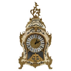 Reloj italiano de bronce y madera con pila de aguja francesa Años 90