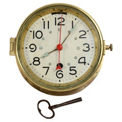 Brass 7-day winding nautical wall clock, signed S. Marti 1931.