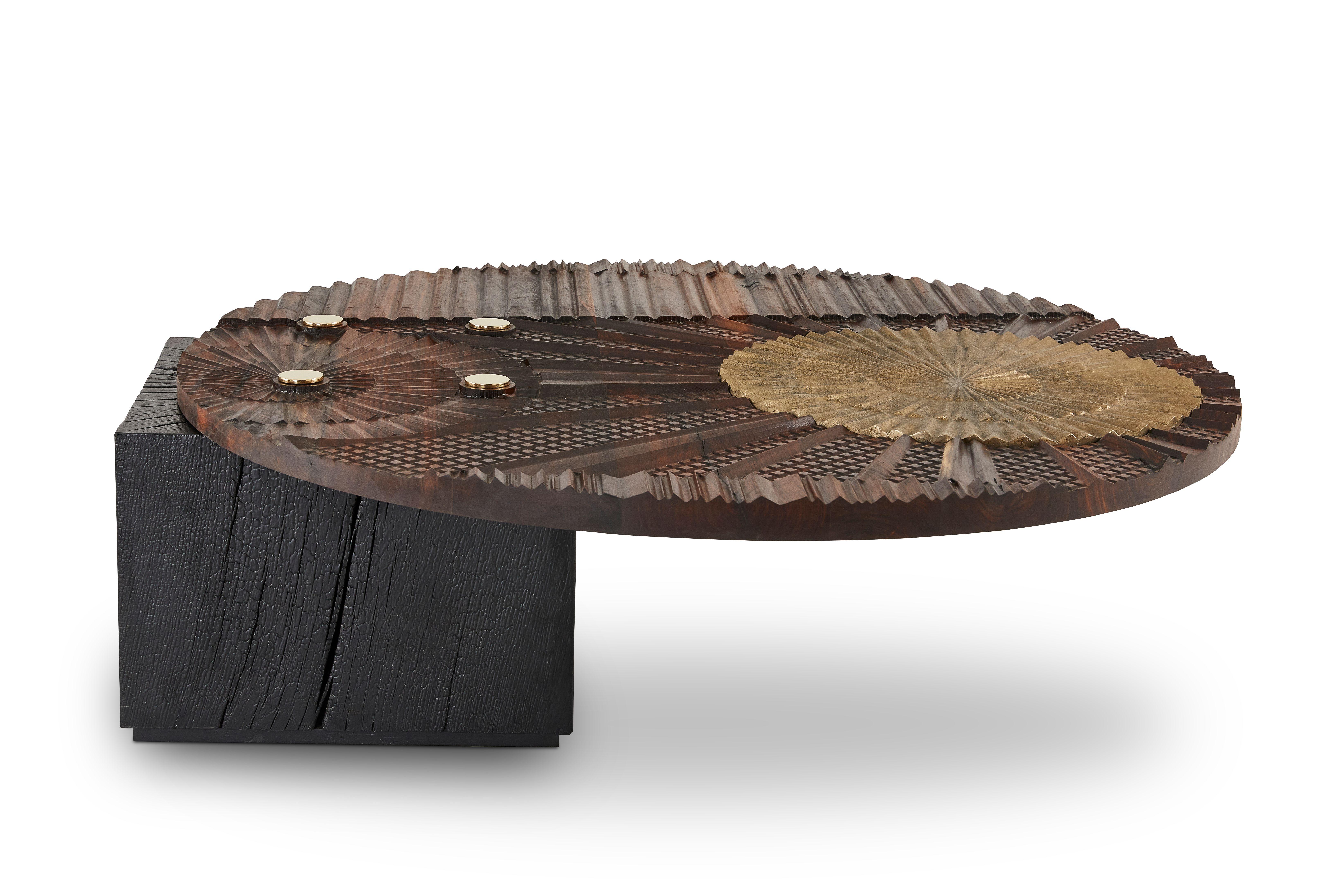 Oromo coffee table by Egg Designs
Dimensions: 125 L X 120 D X 49 H cm
Materials: walnut timber, solid cast brass, brass, shou sugi ban solid oak cant.

Founded by South Africans and life partners, Greg and Roche Dry - Egg is a unique perspective