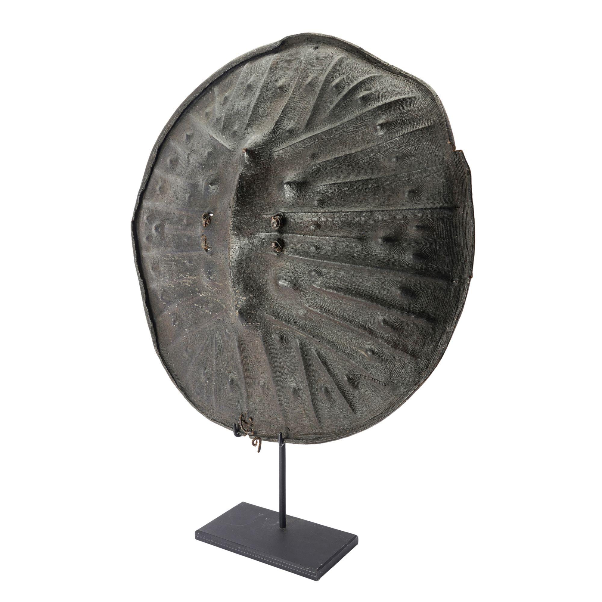 Ethiopian leather warrior's shield made of molded hippopotamus hide. Among the Oromo and Sidama peoples of southern Ethiopia, hide-covered shields connote the courage of warriors and are important insignias of manhood. Such shields are often made of
