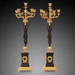 Oromolu with Patina Bronze and Marble Plinth Candelabras