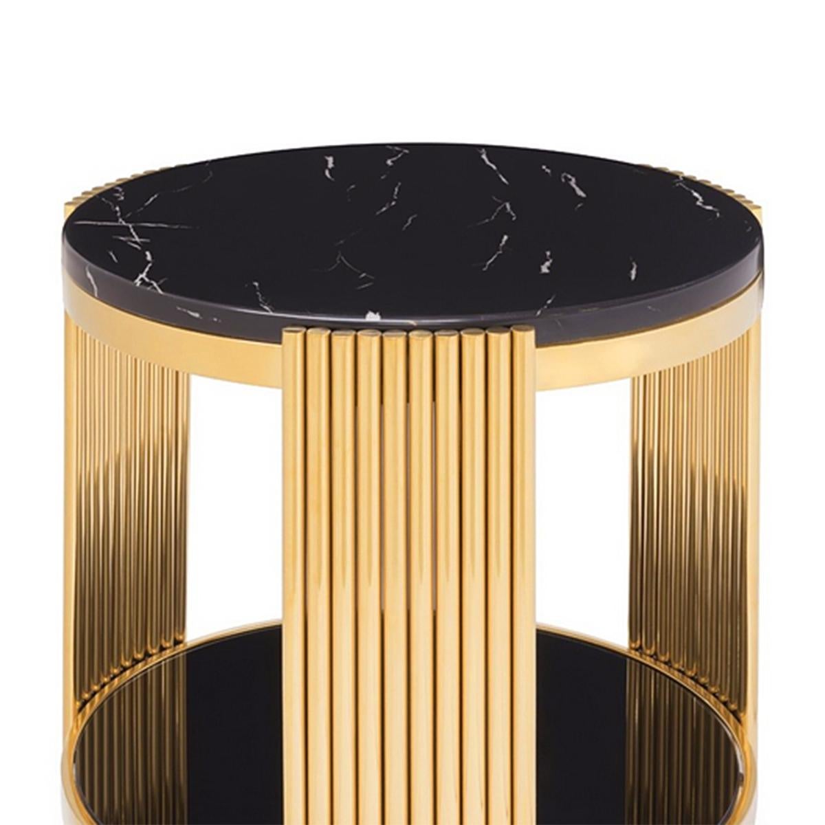 Side Table Ororods Rounds with structure 
in steel in gold finish, with black resin marble up 
top and with black glass bottom top.