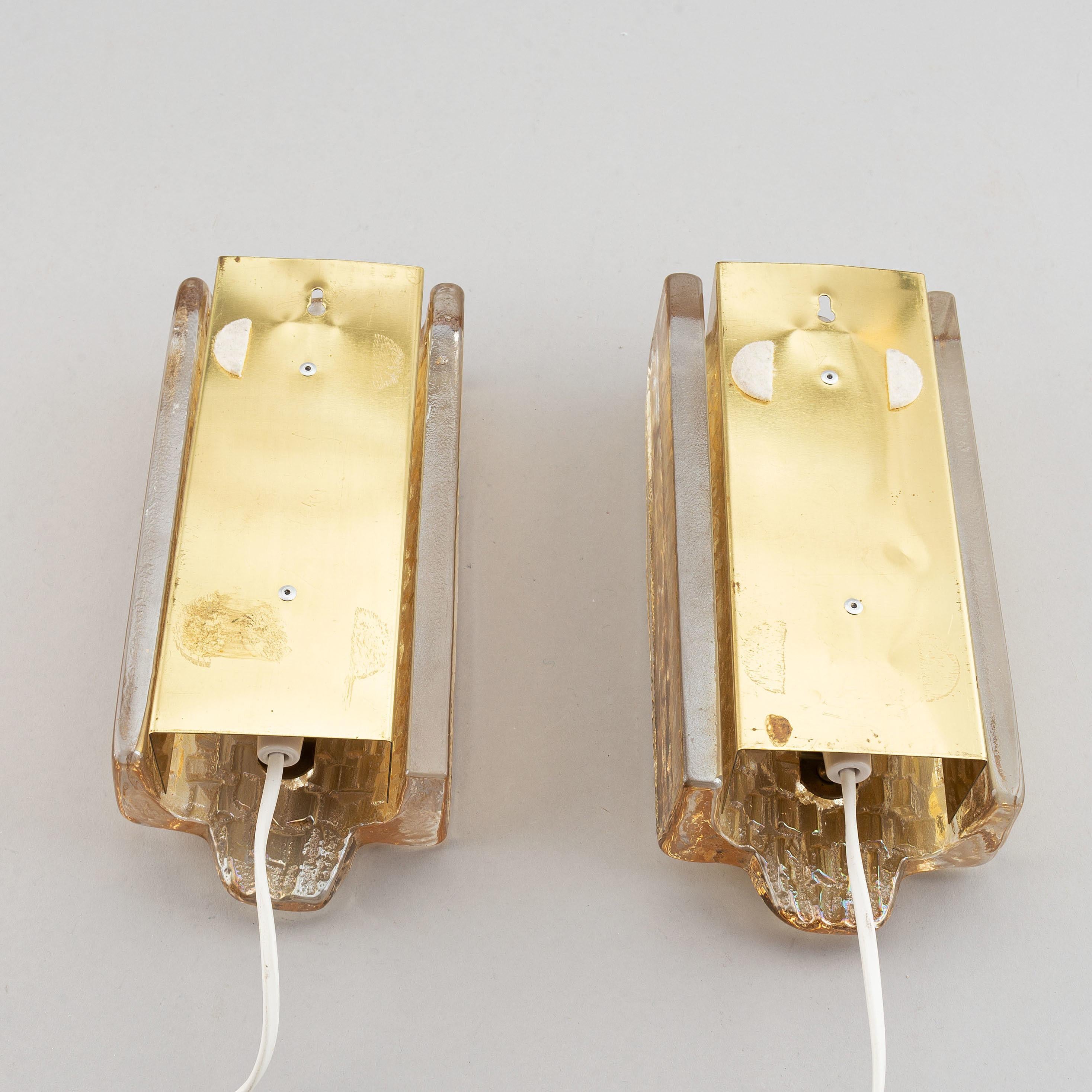 Swedish Orrefors a Pair of Cast Glass and Brass Wall Light, Sweden, 1960 For Sale