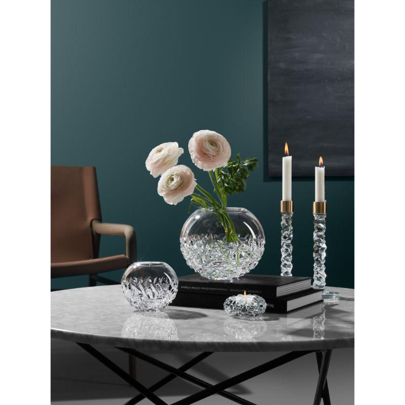 The Carat collection is based on a contemporary interpretation of the traditional cut glass for which Orrefors is world-renowned. The Carat Votive candle holder, available in two sizes, is covered with the collection’s characteristic asymmetrical