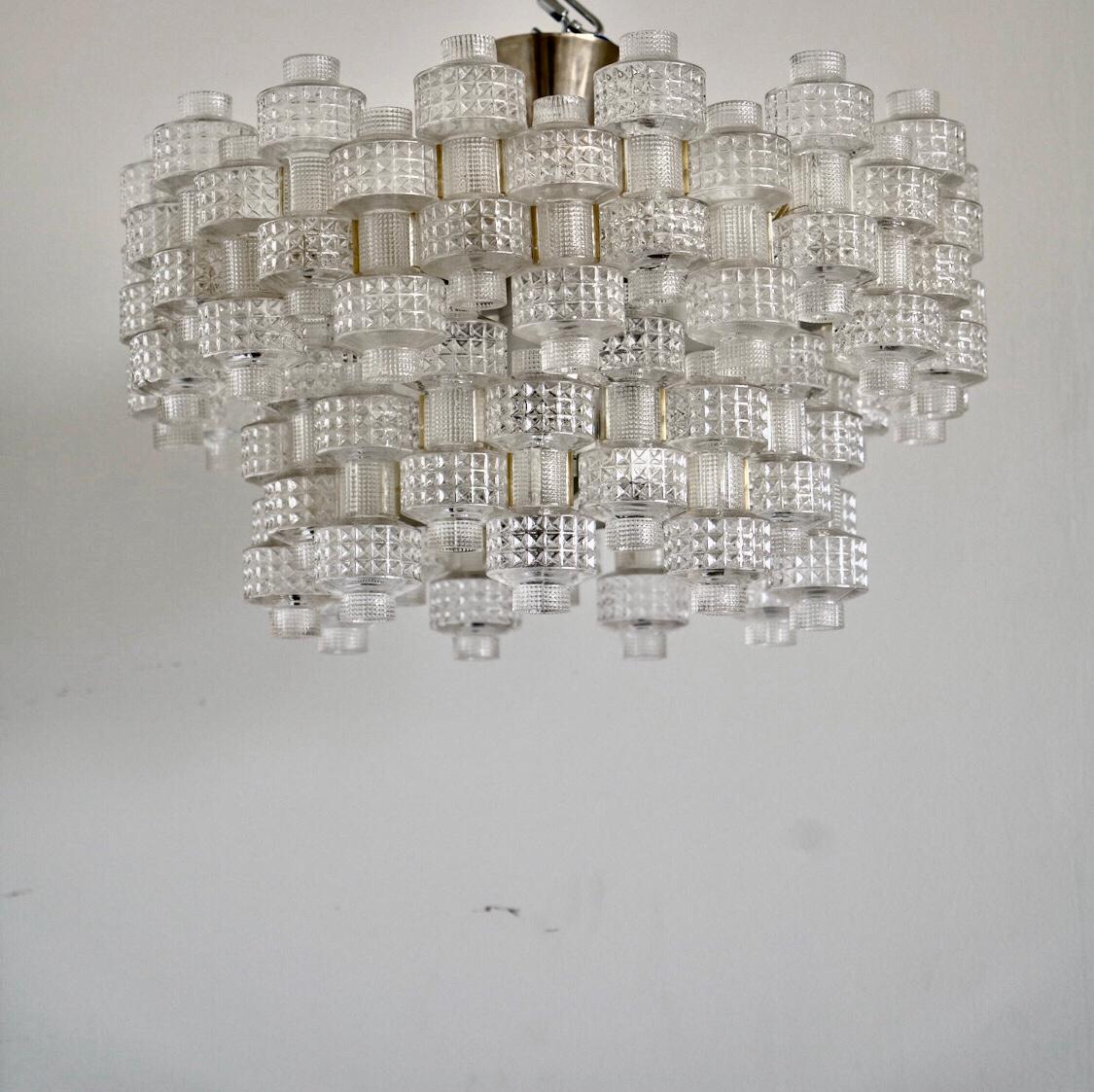 A chandelier designed by Gert Nyström, Sweden, Circa 1960th. Glass produced by Orrefors. 9 E27 sockets, existing wires, rewiring available upon request.