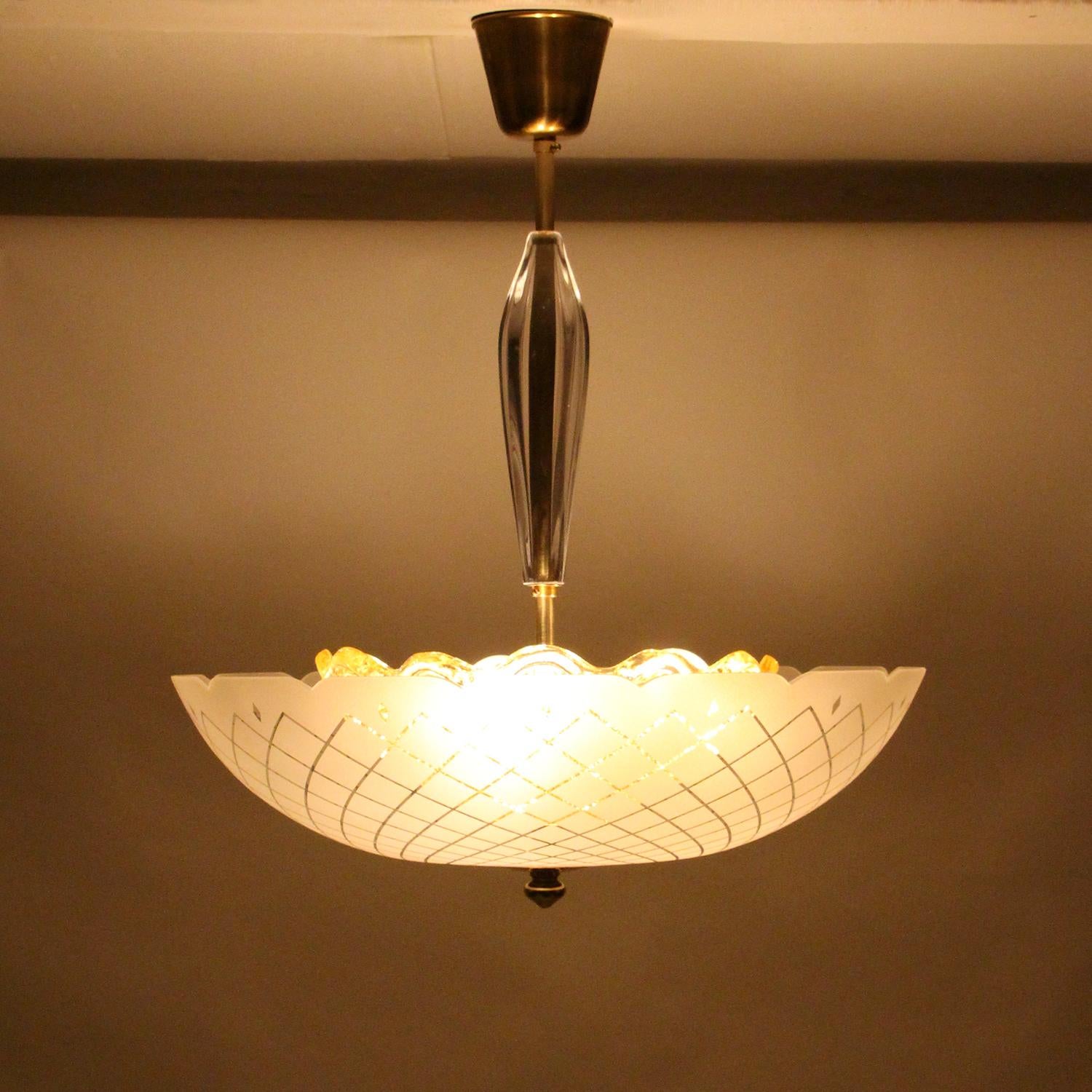Orrefors chandelier by Lyfa/Orrefors in the late 1950s, most likely designed by Carl Fagerlund, who is famous, and celebrated, for his amazing crystal lights, Scandinavian midcentury crystal glass and brass ceiling flush light in very good vintage