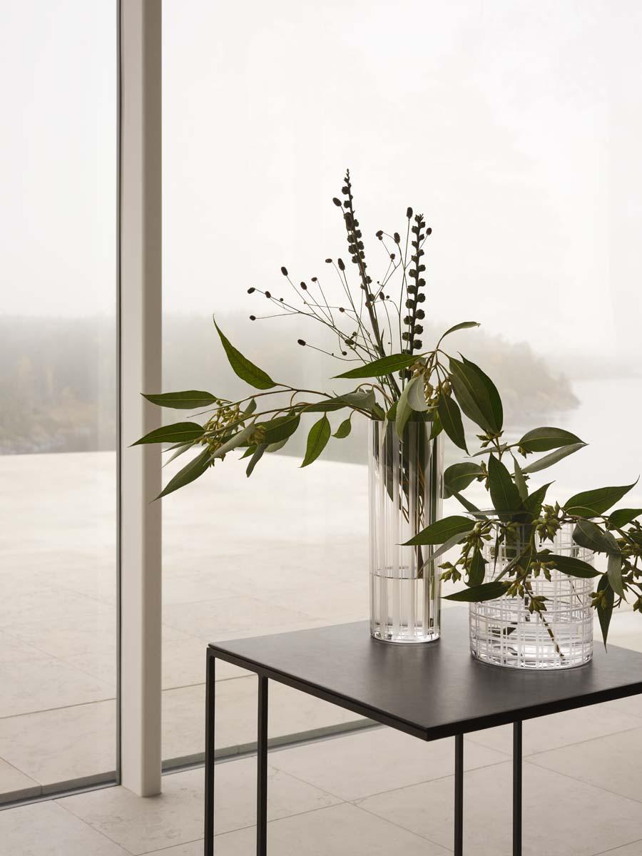 The low cylinder vase with a check motif in the Cut In Number collection from Orrefors is ideal for top-heavy floral arrangements. The satin finished cuts on the vase beautifully emphasize the transparency of the clear crystal. Designed by Ingegerd