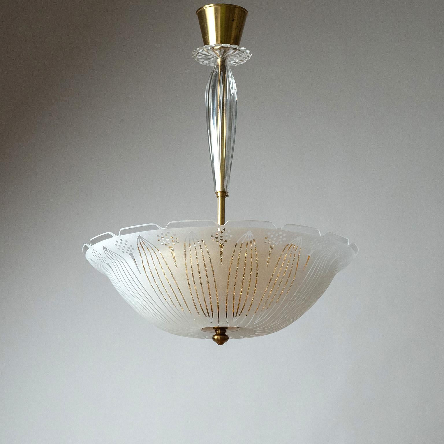 Charming Orrefors glass chandelier from the 1940-1950s. Large, bowl-shaped, glass diffuser with etched or sand-blasted abstract floral decorations. Inside is a second glass diffuser of amber glass with a contrasting wavy texture. Fine original