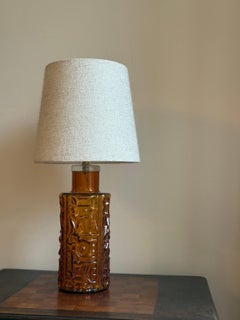 Orrefors Eclectic Mid-Century Table Lamp in Amber Colored Glass. Sweden, 1960's.
