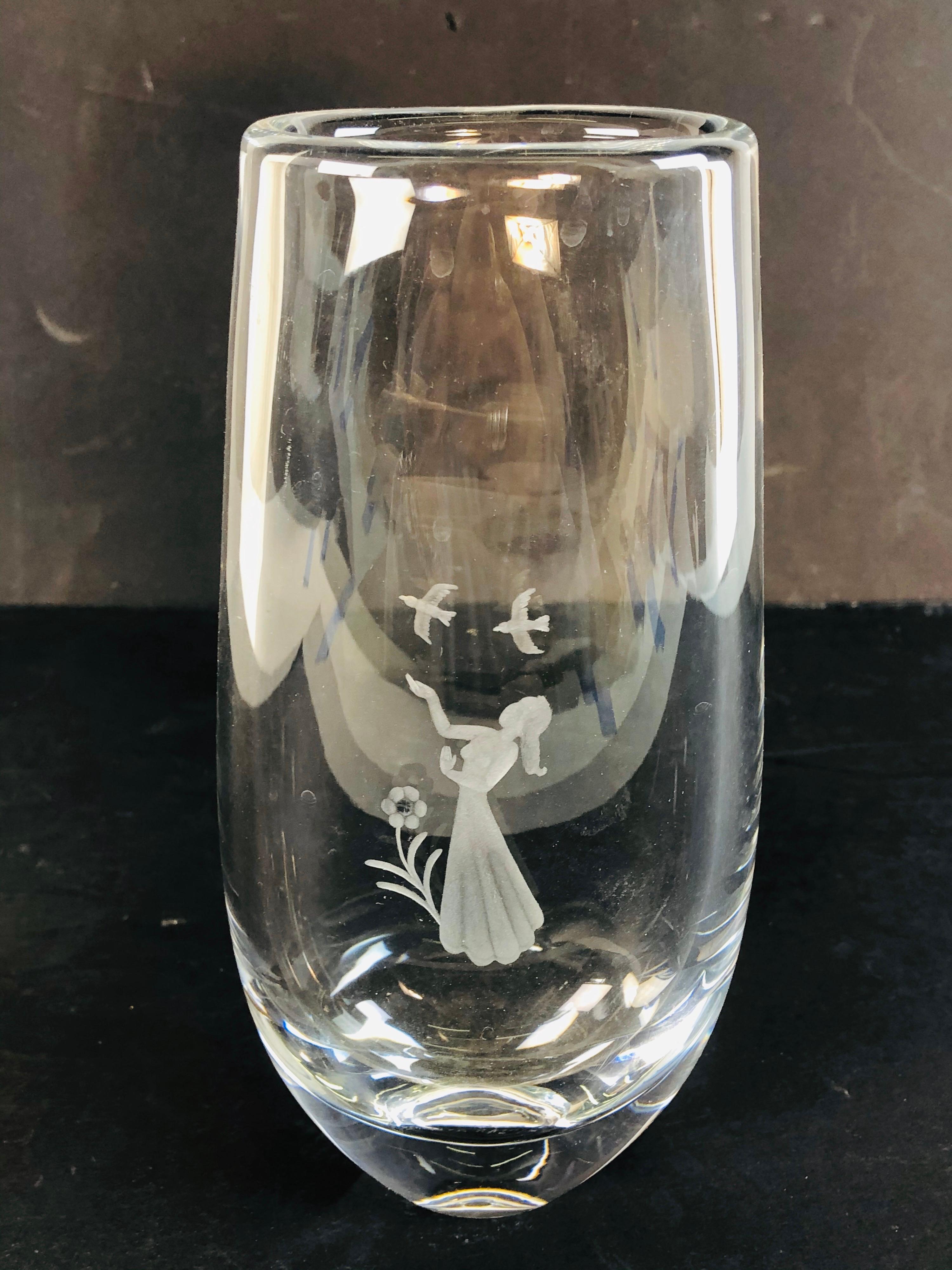 1960s glass vase by Orrefors with girl with birds etched scene. Hand blown and marked underneath.