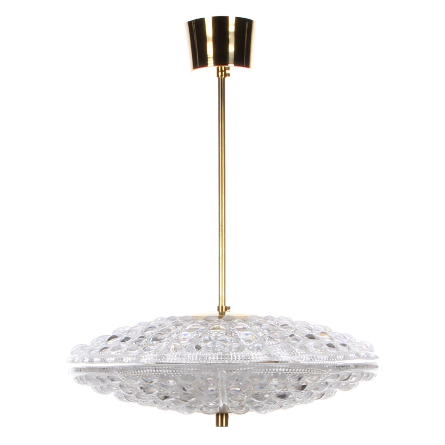 Orrefors Merkur, crystal pendant light by Carl Fagerlund (presumed) for LYFA/Orrefors in the 1960s - gorgeous Scandinavian lamp with crystal glass and brass, in excellent vintage condition.

An impressive crystal lamp comprised of two thick double