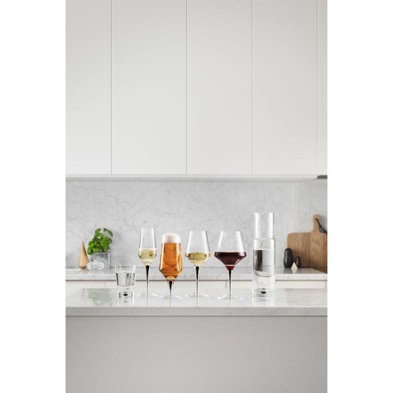 Metropol Tumbler from Orrefors, which holds 8 oz, is an all-purpose glass ideal for a wide variety of drinks. It is a great complement to the wine glasses in the collection if used as a water glass. The tumbler is mouth-blown in Sweden by expert