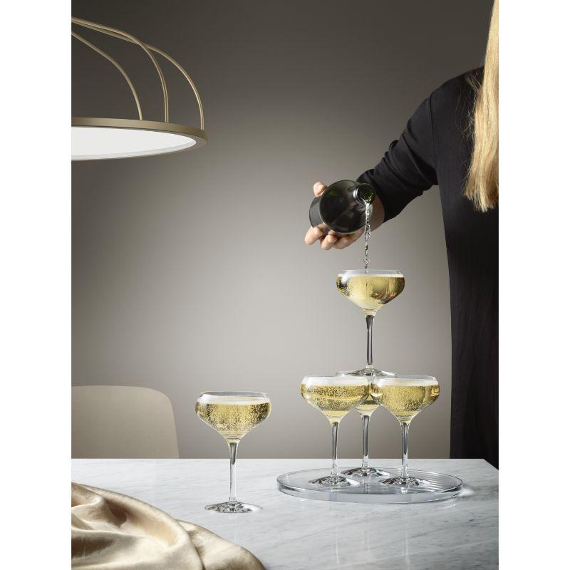 More Coupe from Orrefors, which holds 7 oz, is well-suited for sparkling beverages or cocktails, with the wide bowl delivering elegance to the drink. The glass is also ideal for serving appetizers or desserts. Designed by Erika Lagerbielke.
