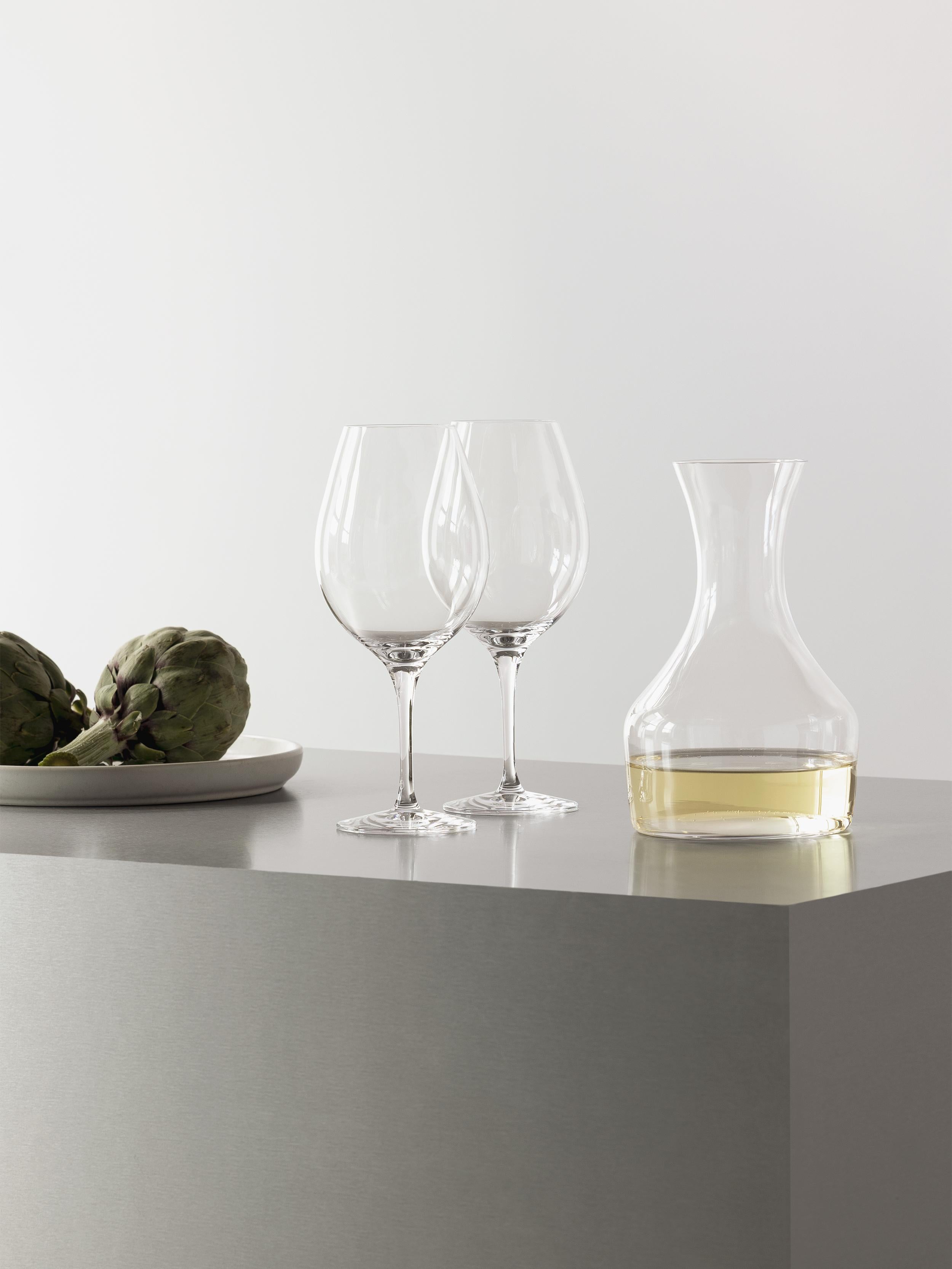 More XL from Orrefors, which holds 20 oz, is excellent for flavorful red wines. The large, tulip-shaped bowl allows the wine to breathe and develop in the glass, bringing out its aromas. Designed by Erika Lagerbielke.
