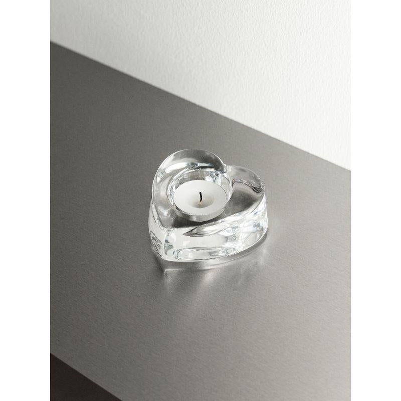 My Heart Votive is shaped like a heart – the universal symbol of care, warmth, and love. The votive is made of thick, clear crystal with a round hole, allowing the candle to sink down enough for the flame to beam through the glass, which brings soft