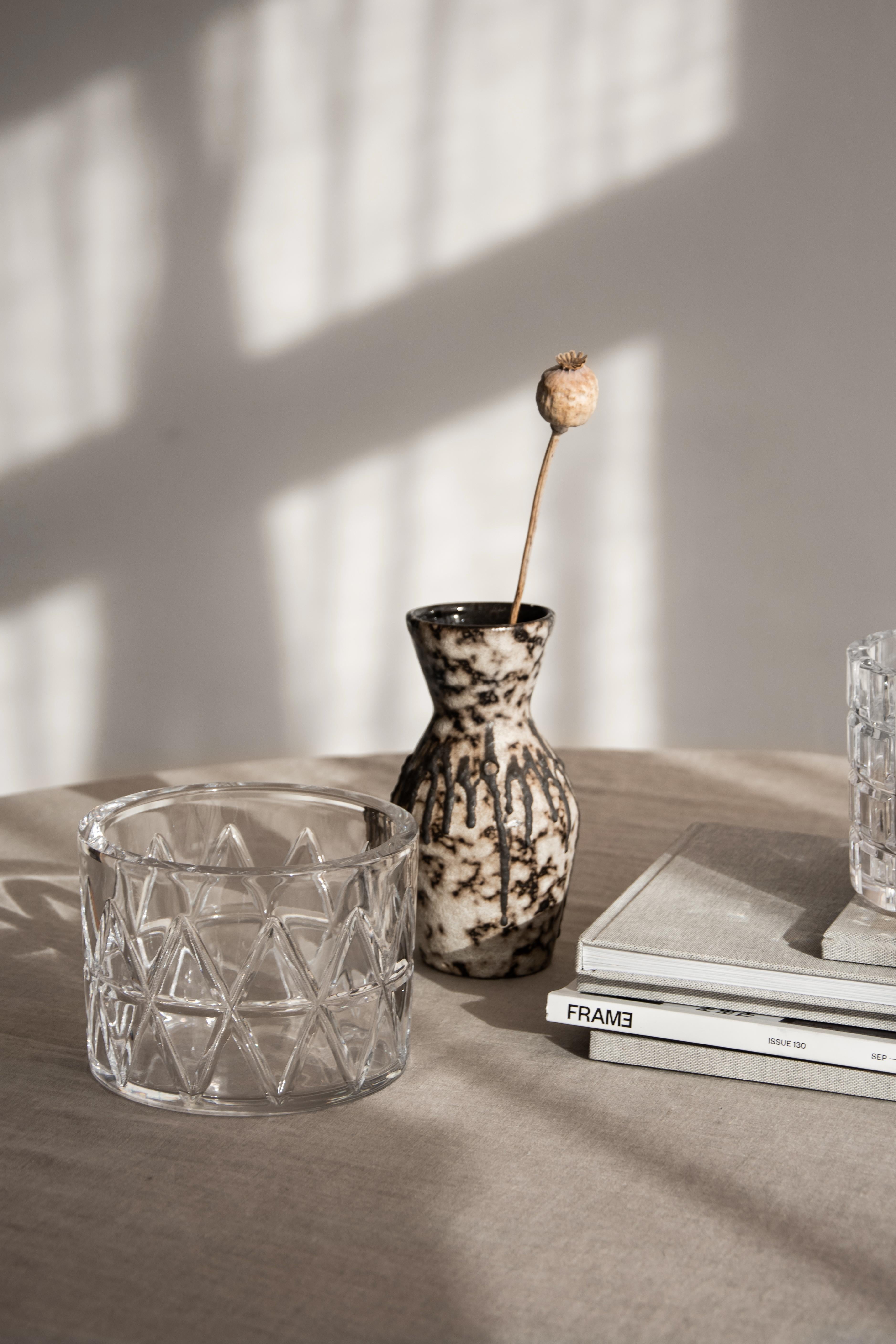 Peak Bowl from Orrefors is made of thick, clear crystal with a motif inspired by the majestic mountain peaks from the northern regions of Scandinavia. The bowl is decorative as well as functional. Designed by Martti Rytkönen.
