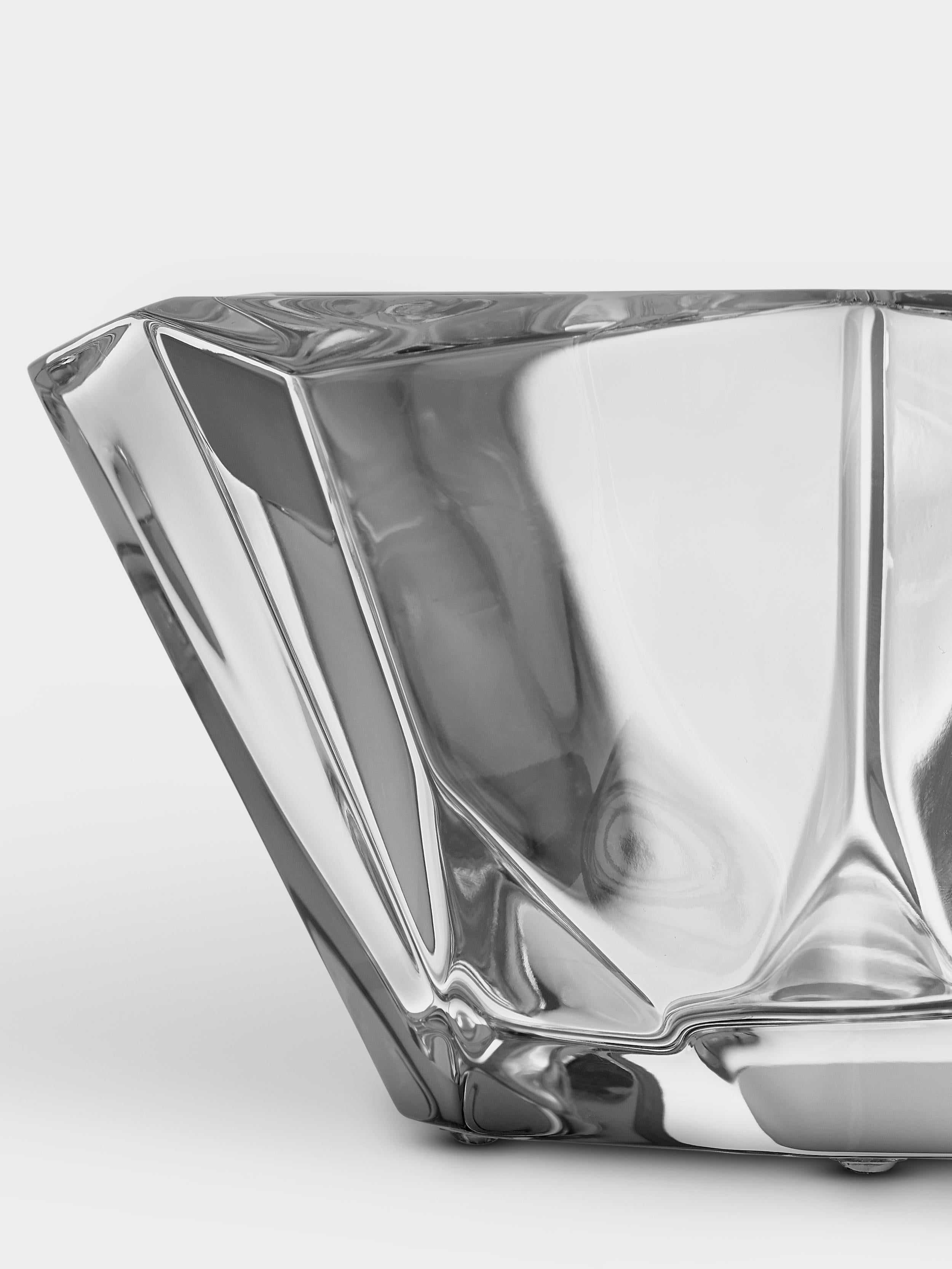 Precious Bowl from Orrefors has an asymmetrical design that beautifully refracts the light reflected in the thick crystal. The bowl is a decorative centerpiece delivering an elegant feel to the home. Designed by Malin Lindahl.
