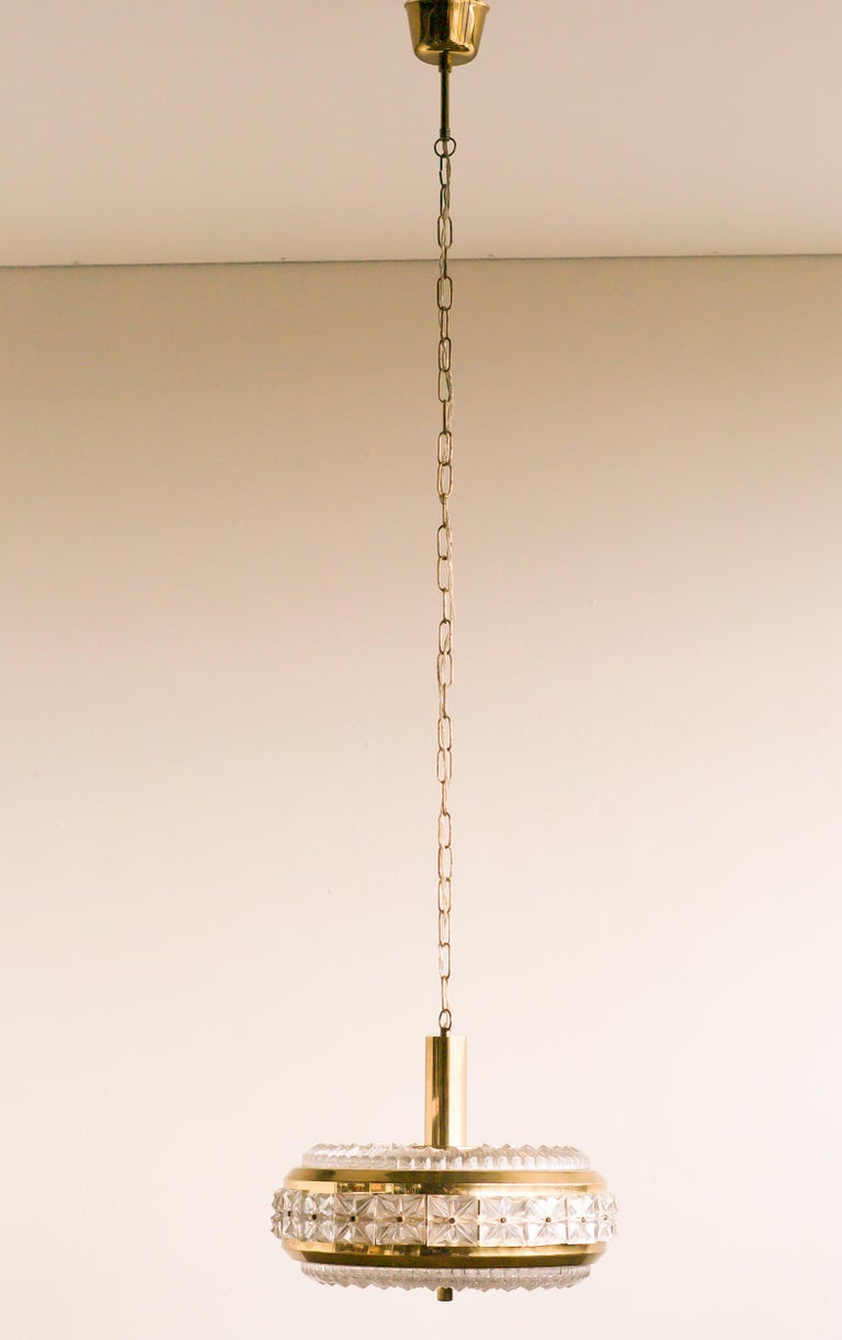 Scandinavian Modern Orrefors Pressed Glass and Brass Pendant For Sale
