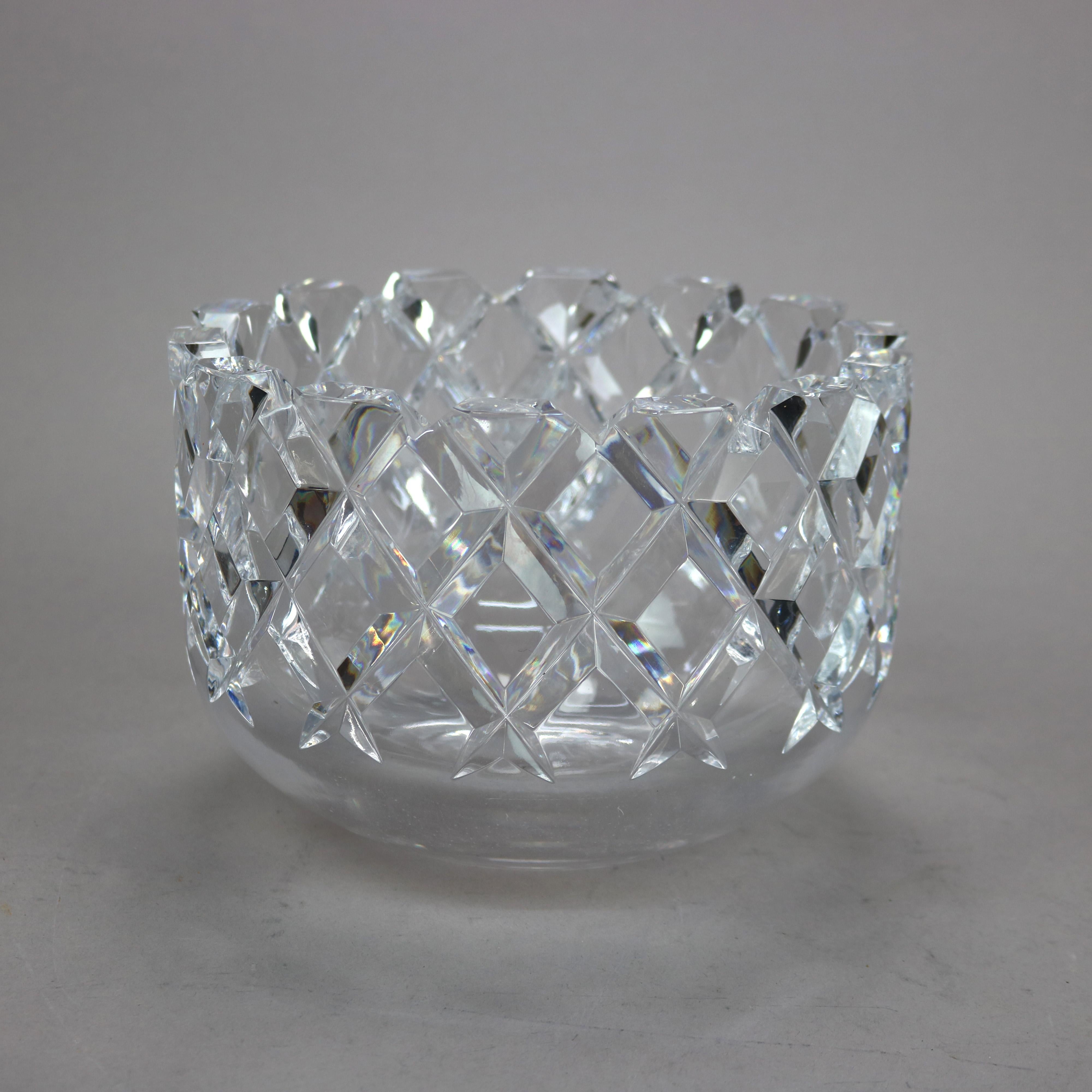 A crystal fruit bowl by Orrefors in the Sofiero pattern offers checkered diamond pattern with original label and signature as photographed, 20th century.

Measures - 5.5'' H X 8'' W X 8'' D.

Catalogue Note: Ask about DISCOUNTED DELIVERY RATES