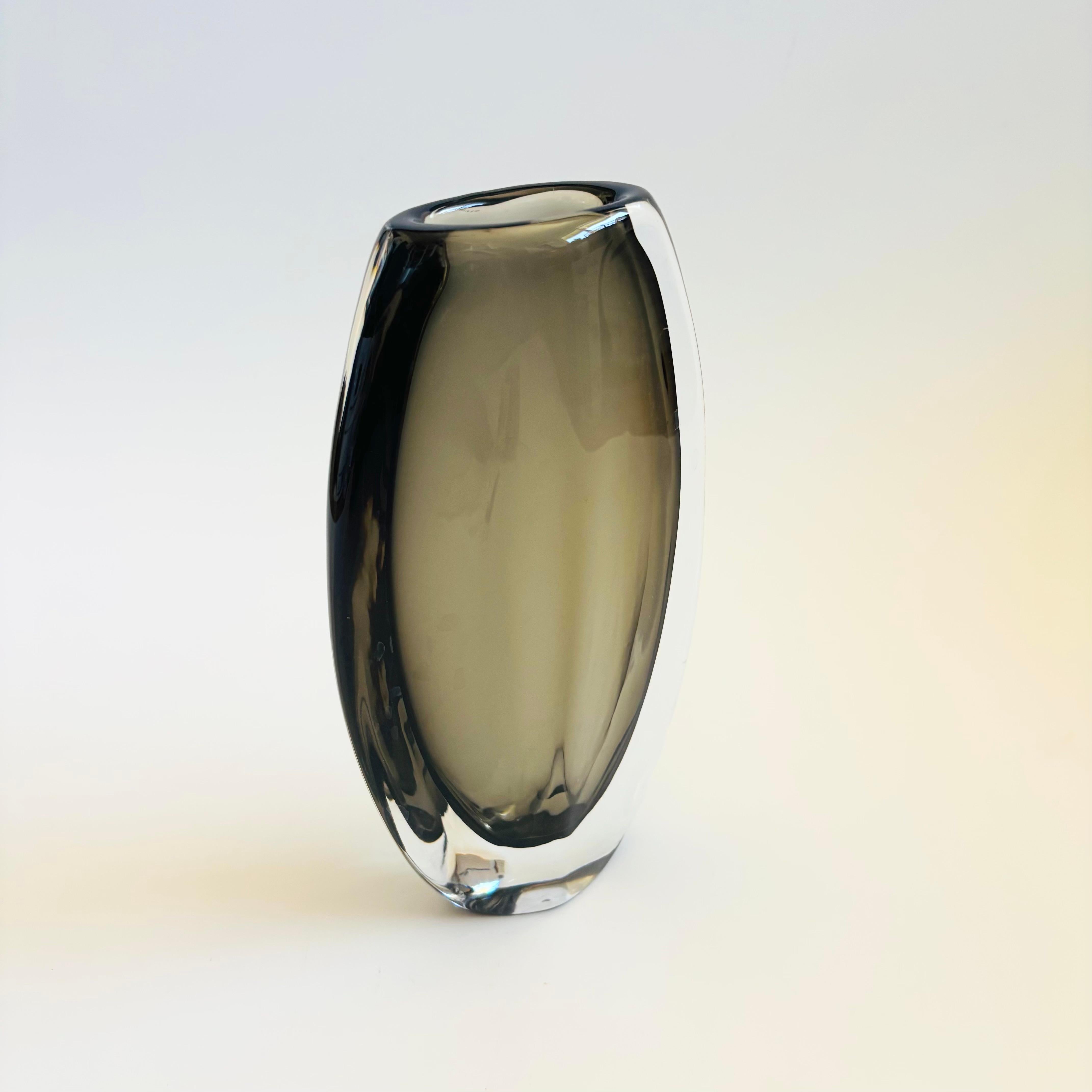 A mid century art glass vase designed by Nils Landberg for Orrefors, Sweden. From the 
