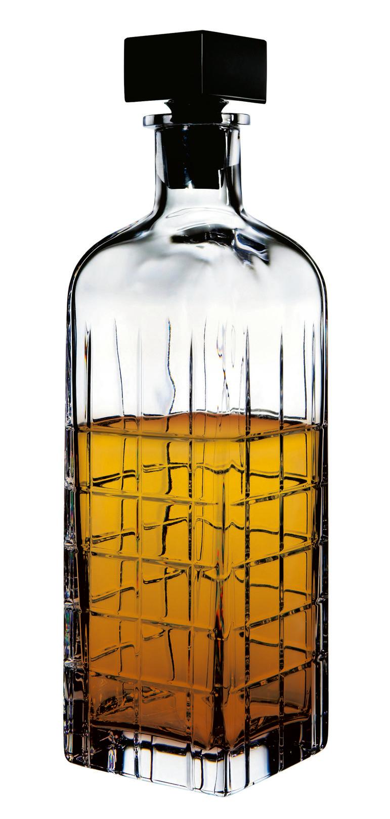 Street Decanter from Orrefors holds 35 oz and is ideal for serving spirits. The decanter has a checked motif of straight lines inspired by the criss-cross streets and avenues of Manhattan, New York, with a square, black stopper providing contrast to