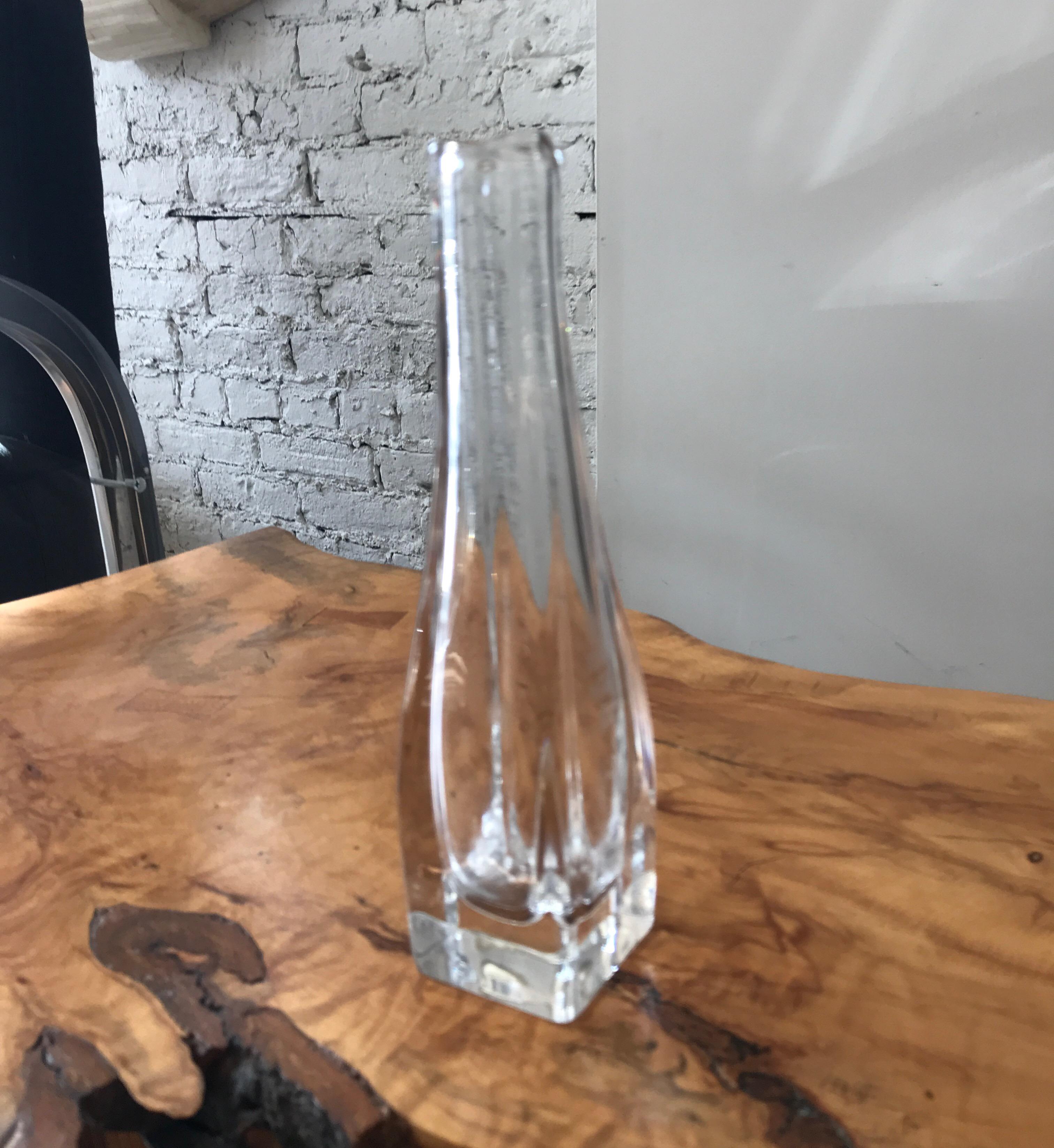 Thick clear glass crystal vase by Orrefors.
Square tapering elegant decorative object.
Fine midcentury tabletop decor.
Stamped Orrefors to the underside.