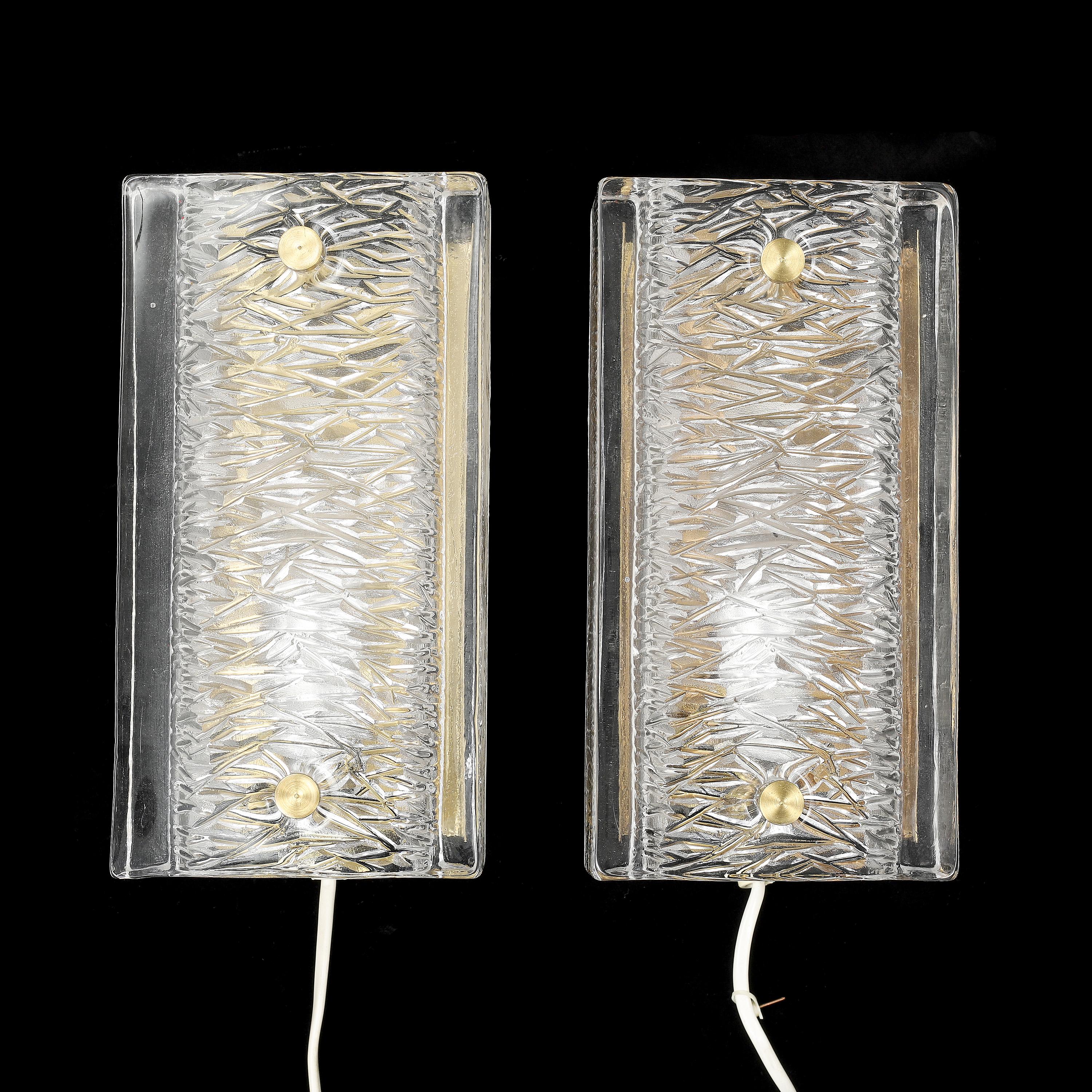 Mid-Century Modern Orrefors wall light cast glass and brass a pair Sweden 1960 For Sale
